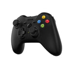 Black gaming controller with colorful buttons on a white background