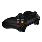Black gaming controller with colored buttons on a white background